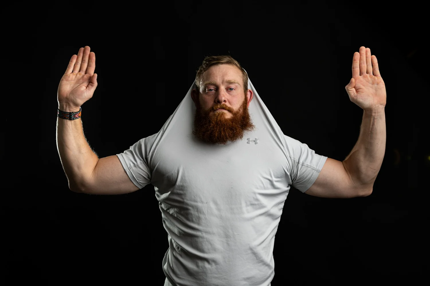 Expressive branding portrait against a dark backdrop