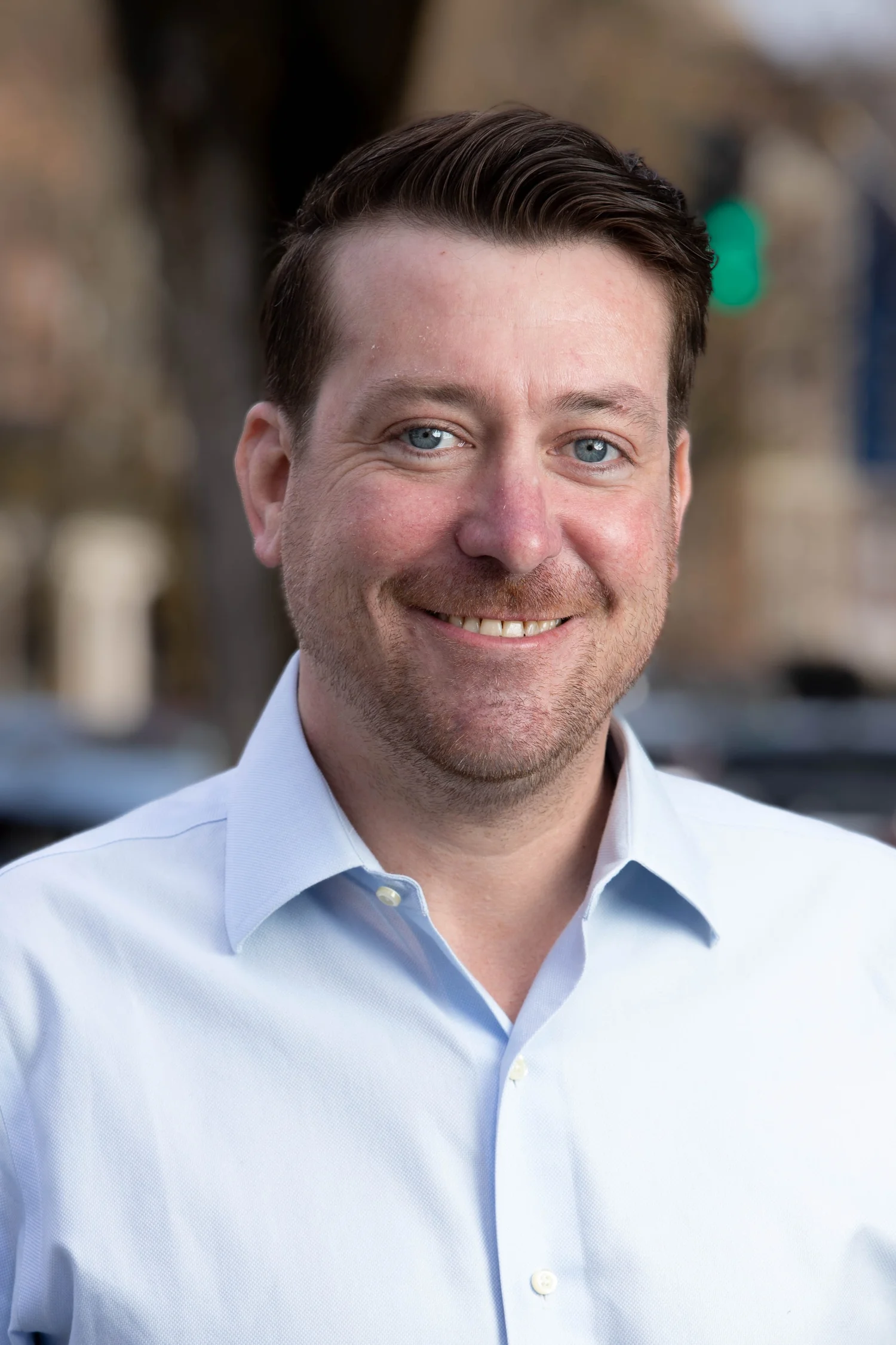 Professional team member photographed outdoors